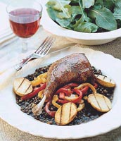 crispy duck confit with balsamic lentils and roast pimentos